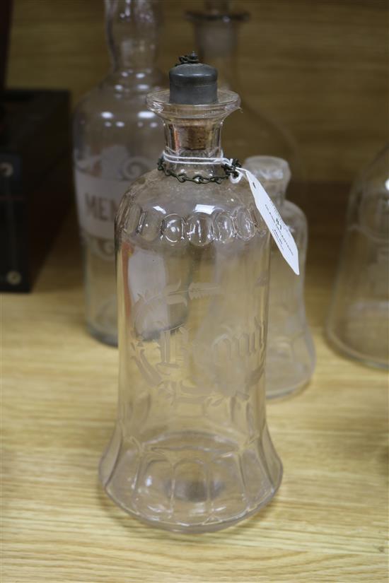 A quantity of glass decanters tallest 31cm